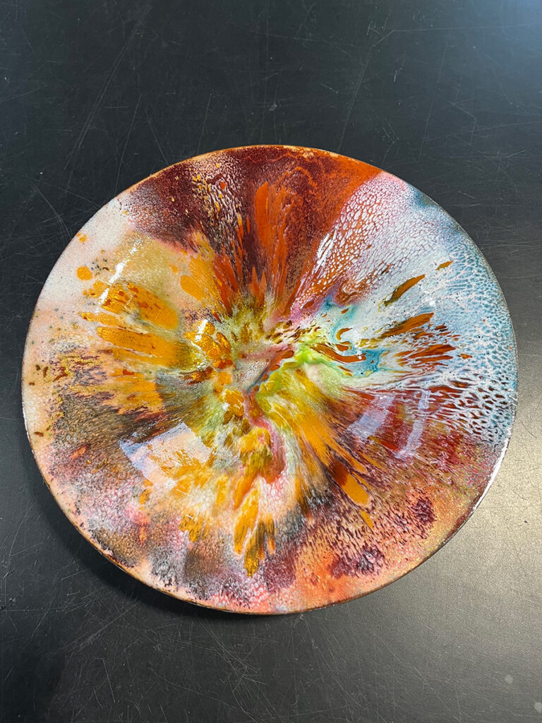 glass on copper bowl