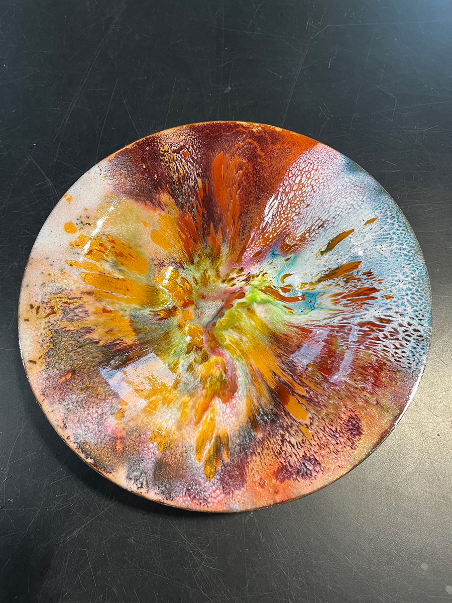 glass on copper bowl